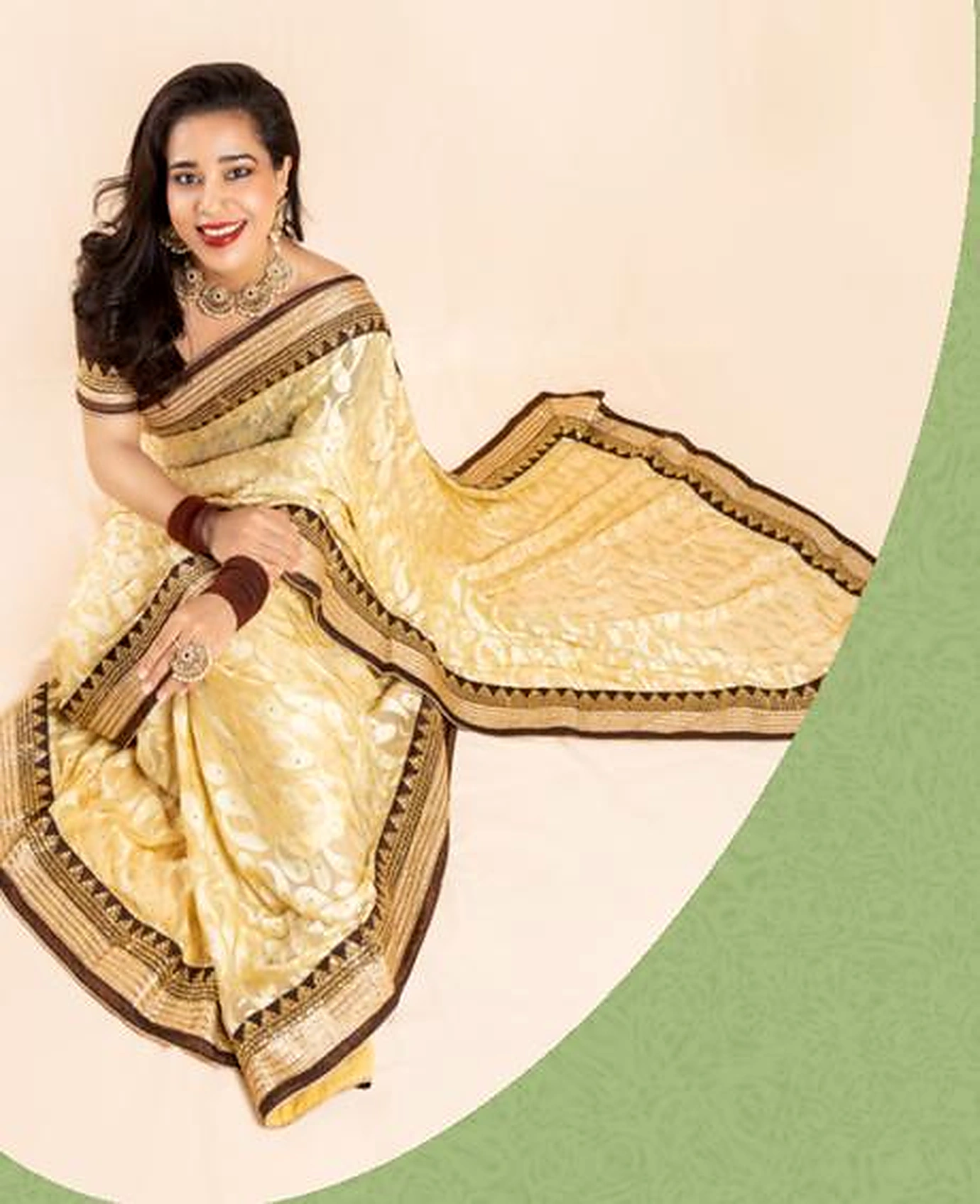 Zun Poe Phyui, known as Sush, wearing cream and gold South Asian attire